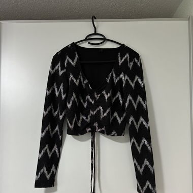 schwarzes langarm-Top mit Glitzer