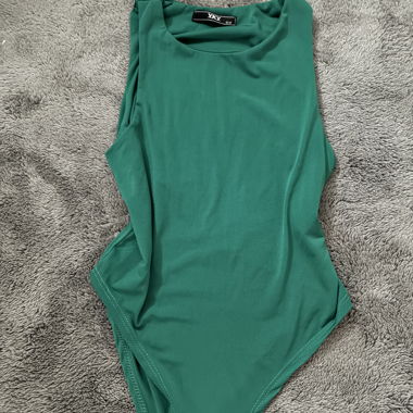 green bodysuit 