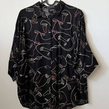 Camicia ampia