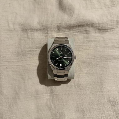 Orologio in acciaio con quadrante verde
