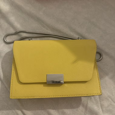 Yellow clutch bag