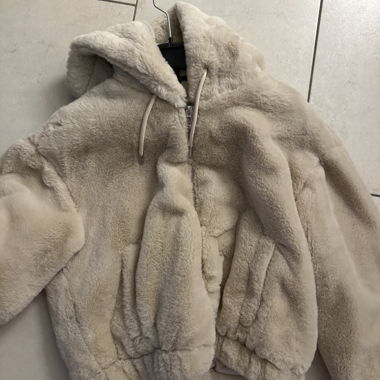 Veste duveteuse - donne beaucoup de chaleur
