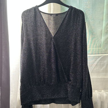 Top in maglia con scollo a V glitterato