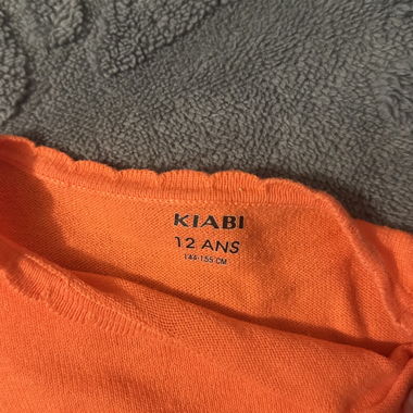 Korallenroter Pullover 