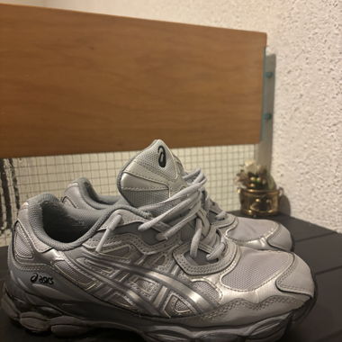 Silver Asics sports shoes