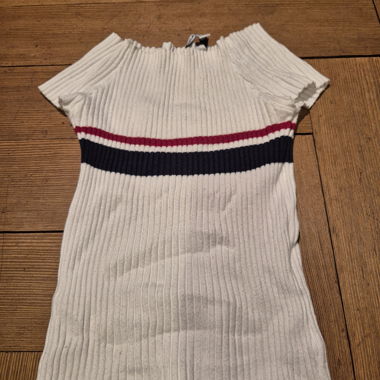 Top in maglia a righe e coste
