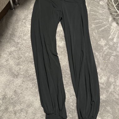 Loose black trousers