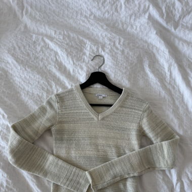 Subdued cream v-neck sweater