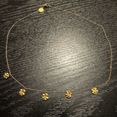 Gold-coloured necklace with round pendants