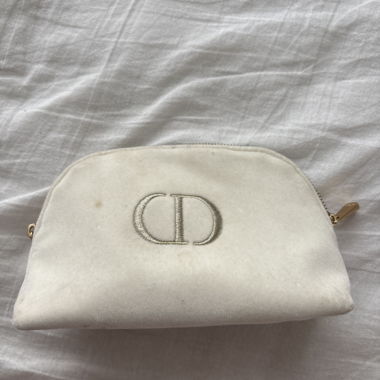 white Dior Pouch