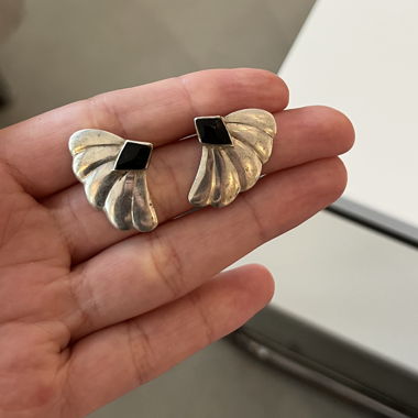Silver-colored stud earrings