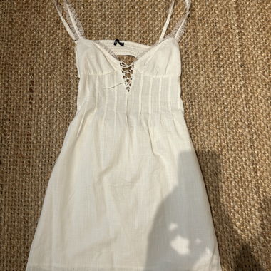 White lace-up dress from Bershka