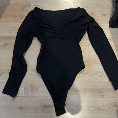 Black long-sleeve bodysuit