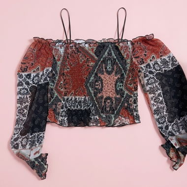 Top crop fantasia maniche lunghe