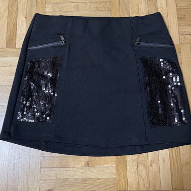 Black children's skirt with sequins, size 140