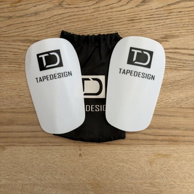 Protège-tibias à motif Tapedesign