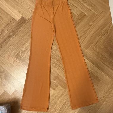 Orange Stoffhosen