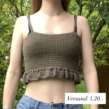 Gehäkeltes Top mit Schösschen-Detail