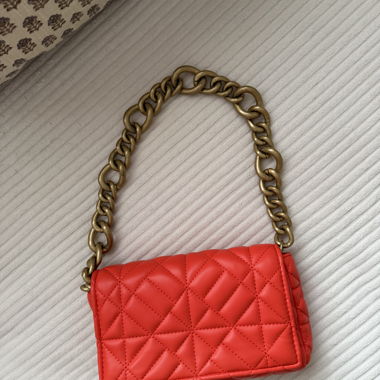 Red crossbody bag with chain