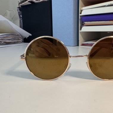 Sonnenbrille rund goldfarben 