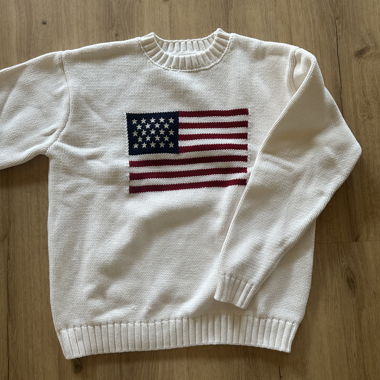 Pull en maille blanc avec drapeau américain