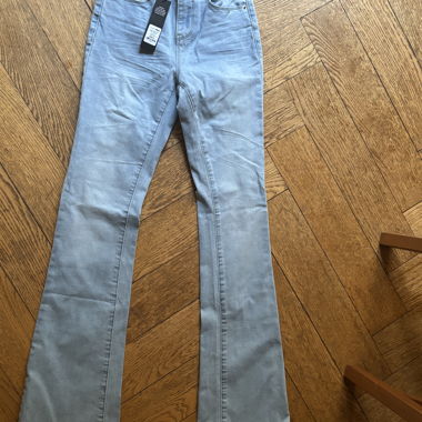 Jeans a zampa vita alta