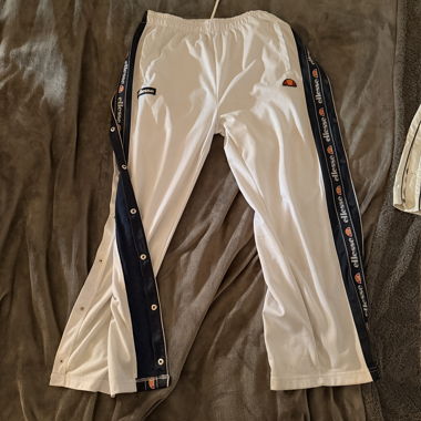 Ellesse track pants with snap buttons