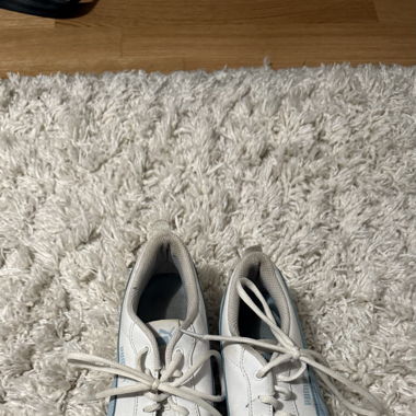 white Puma sneakers