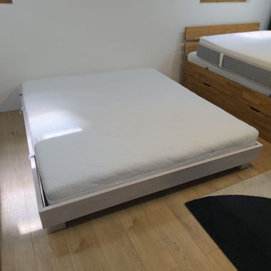 Like-new Hasena solid wood bed with rust