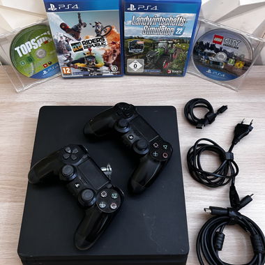 PlayStation 4, 500 GB inkl. 2 Controller & 4 Games