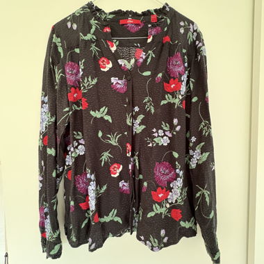 Blusa con motivo floreale