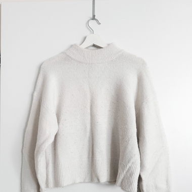 White fuzzy sweater
