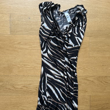 Black dress with beige stripes 