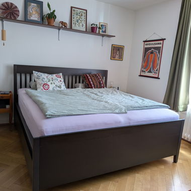 Dark double bed with storage IKEA IDANÄS