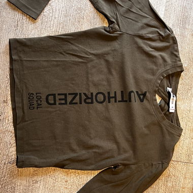 Maglione kaki con schiena scoperta