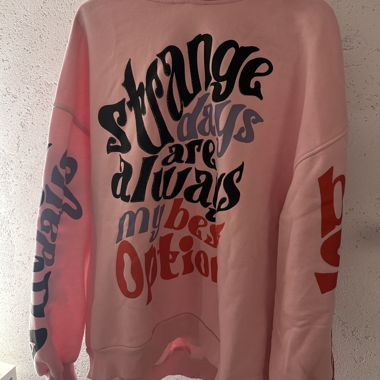 Felpa rosa con slogan