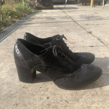 Black heeled oxford shoes