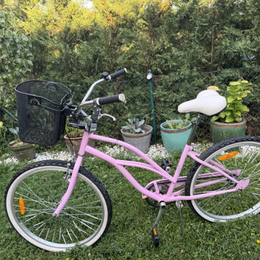 Pink city bike with basket