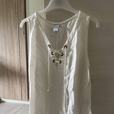 Blouse blanche sans manches 
