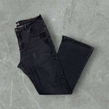 vintage jeans with design on backpockets