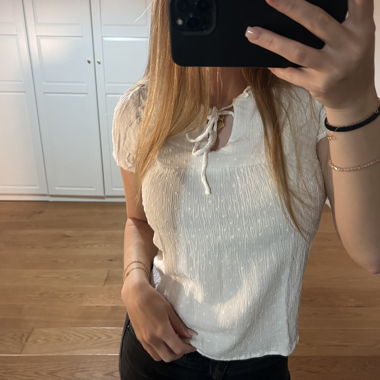 Top bianco a maniche corte
