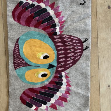 Wall tapestry with owl motif