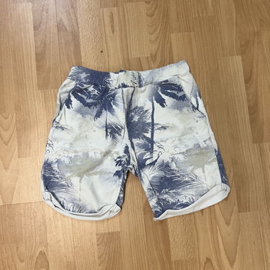 Pantaloncini bianchi con palme