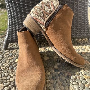 Brown suede ankle boots with woven heel
