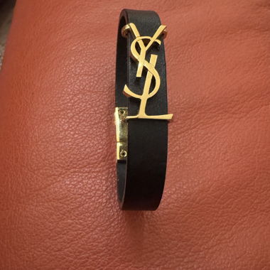 Bracelet YSL noir et doré
