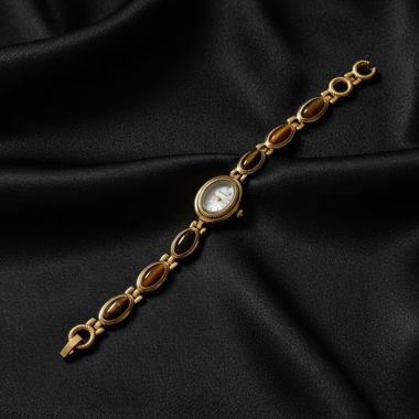 Vintage Armbanduhr mit ovalem Stein im Gold-Ton