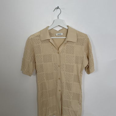 Beiges Sandro Strick-Poloshirt
