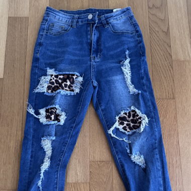 Jeans leopardati a vita alta