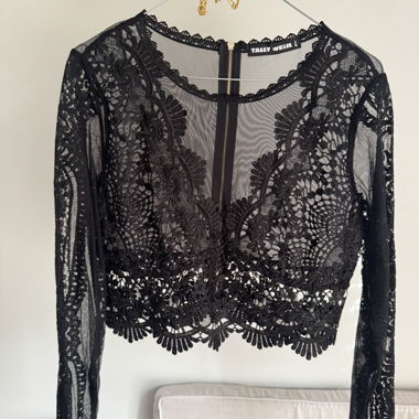 Blusa in pizzo nero