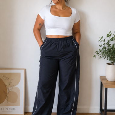 Pantalon de sport noir avec bandes blanches